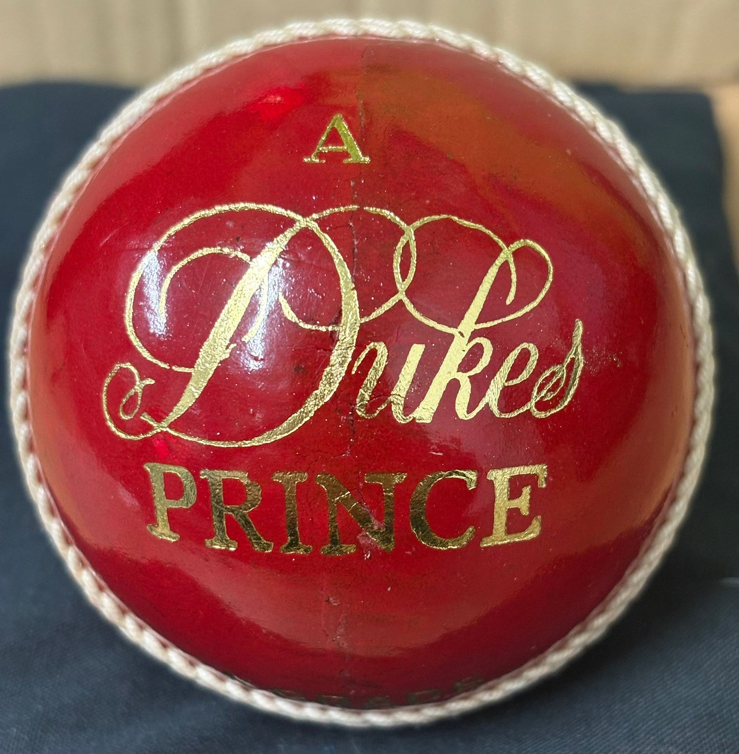 England & Surrey Cricketer Gus Atkinson Signed Red Cricket Ball + Dealer COA