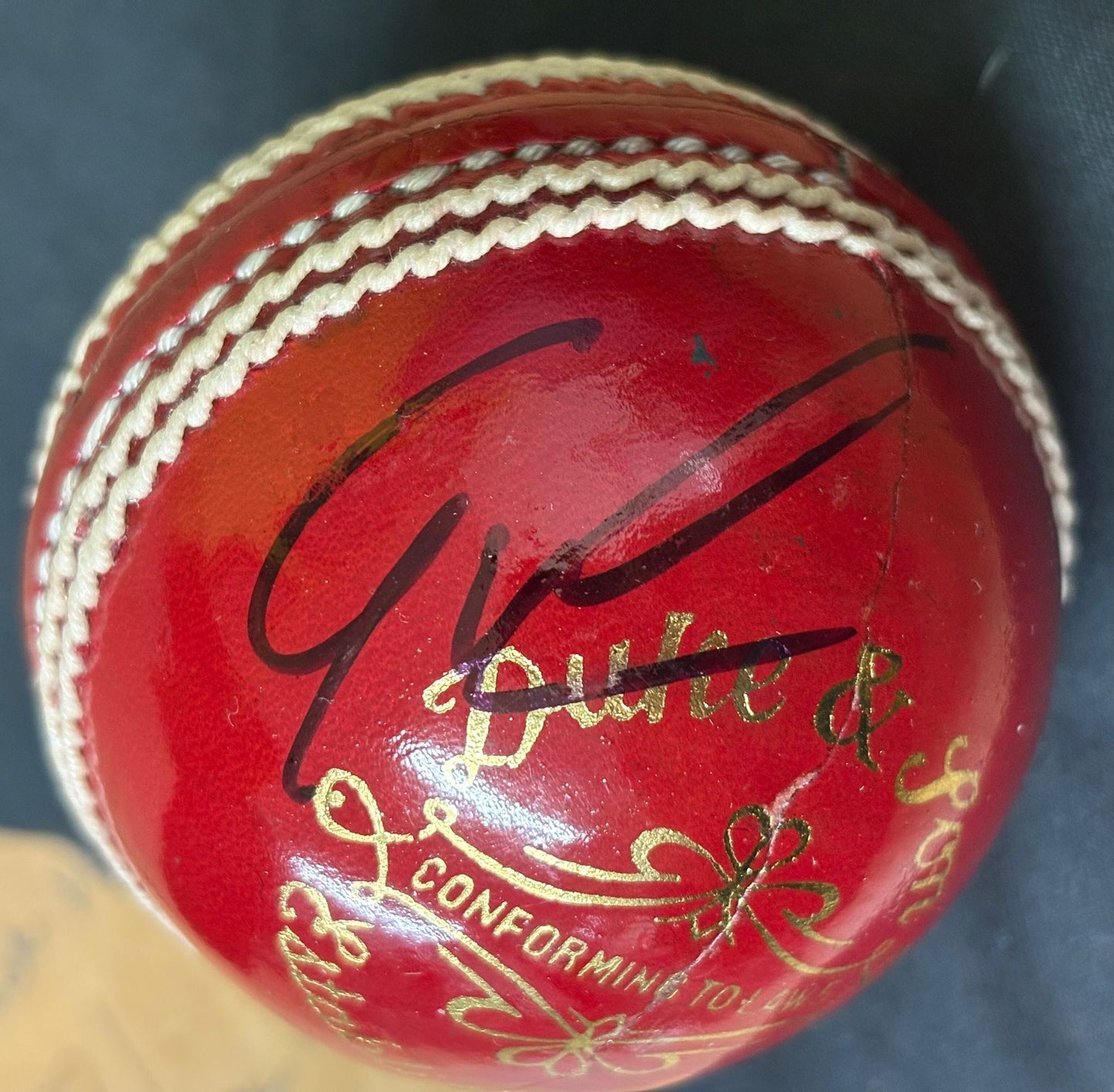 England & Surrey Cricketer Gus Atkinson Signed Red Cricket Ball + Dealer COA